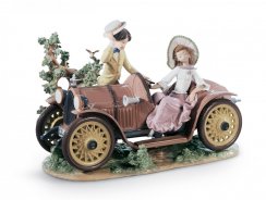 Young Couple with Car Sculpture. Limited Edition