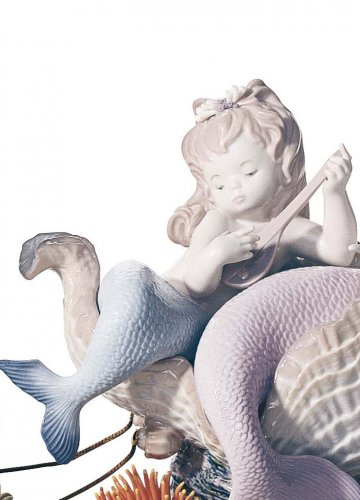 Figurka mořské panny na podvodní cestě. Limitovaná edice