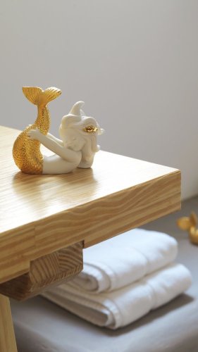Playing at Sea Mermaid Figurine. Golden Lustre
